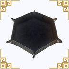 Black hexagonal tray on a white background