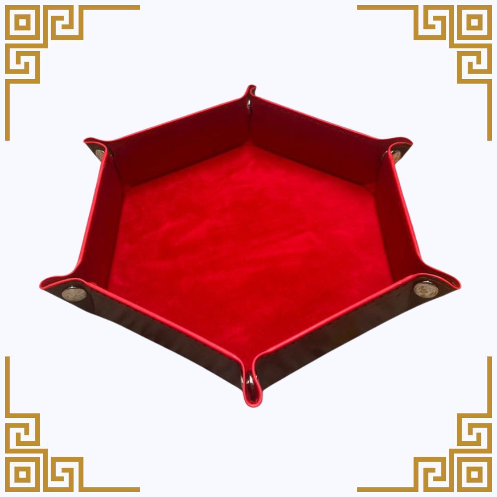 Red hexagonal dice  tray with brown edges on a white background