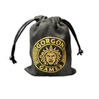 Black drawstring pouch with gold gorgon games emblem on a white background